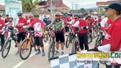 Photo of Semangat Sambut HUT Kemerdekaan ke 77, Seratusan Warga Gowes Tentena-Poso