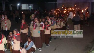 Photo of Ratusan Siswa SD di Poso Pawai Obor Peringati Hari Pramuka 2023